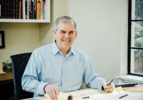 Emmons at drawing the table his father gave him for his 10th birthday / PHOTO: KATHRYN ELSESSER