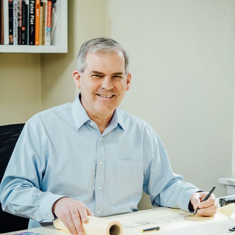 Emmons at drawing the table his father gave him for his 10th birthday / PHOTO: KATHRYN ELSESSER